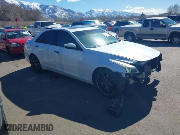 2017 Cadillac CTS Luxury AWD with VIN 1G6AX5SS8H0140131, listed as a IAAI auction lot 41675292 with 125,903 mi miles and . Bid and sale history available at DreamBid. Image 1.