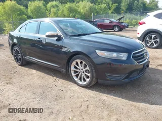 2014 Ford Taurus Limited with VIN 1FAHP2F87EG116842, listed as a IAAI auction lot 42867224 with 202,112 mi miles and . Bid and sale history available at DreamBid. Image 1.
