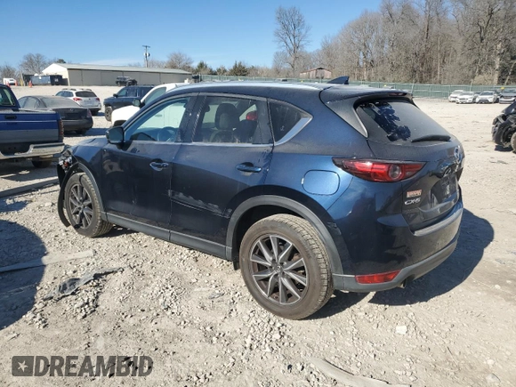 2018 Mazda CX-5 Grand Touring with VIN JM3KFADM4J1341740, listed as a Copart auction lot 46805955 with 99,114 mi miles and Salvage Title. Bid and sale history available at DreamBid. Image 2.