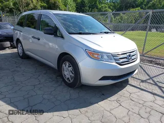 2013 Honda Odyssey LX z VIN 5FNRL5H27DB070846, wystawiony jako IAAI lot #42180699 z przebiegiem 132 649 mil mil oraz . Historia ofert i sprzedaży dostępna na DreamBid. Obrazek 1.