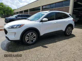 2020 Ford Escape SEL z VIN 1FMCU9H69LUB63401, wystawiony jako Copart lot #62084245 z przebiegiem 96 515 mil mil oraz Czysty tytuł • Clean title. Historia ofert i sprzedaży dostępna na DreamBid. Obrazek 1.