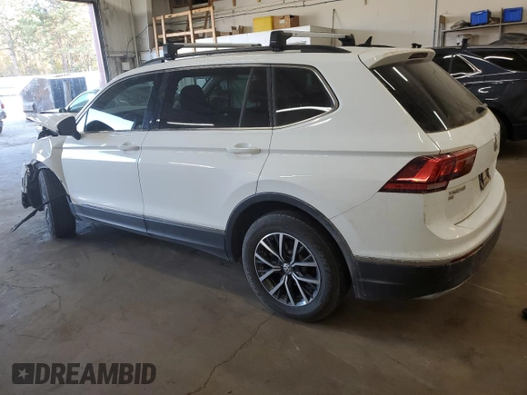 2020 Volkswagen Tiguan SE with VIN 3VV2B7AXXLM058031, listed as a Copart auction lot 76522644 with 34,361 mi miles and Salvage Title. Bid and sale history available at DreamBid. Image 2.