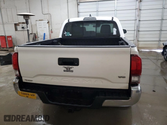 2018 Toyota Tacoma SR5 with VIN 3TMAZ5CN7JM074058, listed as a Copart auction lot 51586455 with 117,877 mi miles and Salvage Title. Bid and sale history available at DreamBid. Image 6.