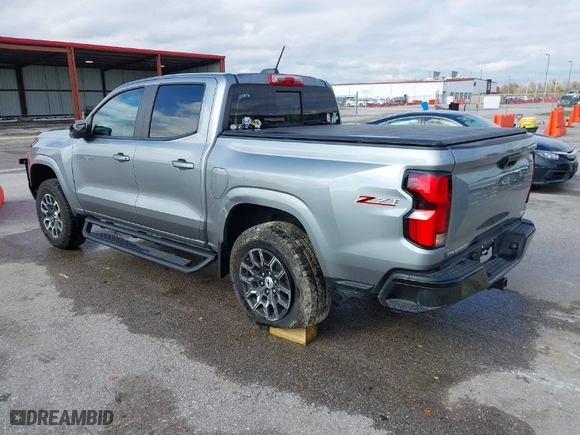 2023 Chevrolet Colorado 4WD Z71 with VIN 1GCPTDEK6P1137701, listed as a IAAI auction lot 40774940 with 10,818 mi miles. Bid and sale history available at carsss.com. Image 3.