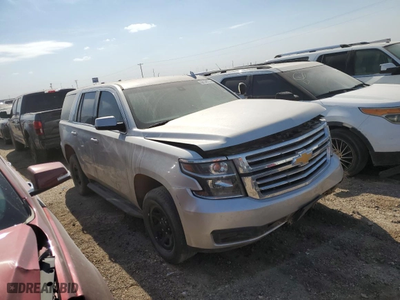 2019 Chevrolet Tahoe Commercial with VIN 1GNLCDEC9KR172936, listed as a Copart auction lot 68144714 with 129,325 mi miles and Salvage Title. Bid and sale history available at carsss.com. Image 4.
