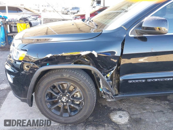 2021 Jeep Grand Cherokee Laredo X with VIN 1C4RJEAG7MC538812, listed as a IAAI auction lot 41337593 with 68,865 mi miles and . Bid and sale history available at DreamBid. Image 6.