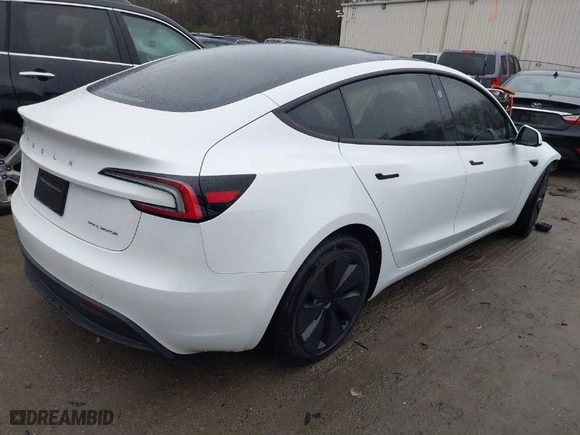 2024 Tesla Model 3 Long Range with VIN 5YJ3E1EB0RF812296, listed as a IAAI auction lot 41799217 with 6,990 mi miles. Bid and sale history available at carsss.com. Image 4.