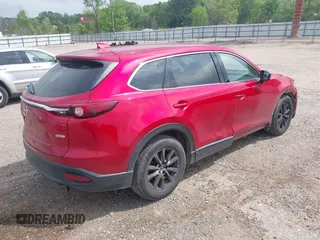 2016 Mazda CX-9 Touring z VIN JM3TCACY0G0101617, wystawiony jako IAAI lot #41850485 z przebiegiem 292 880 mil mil oraz . Historia ofert i sprzedaży dostępna na DreamBid. Obrazek 4.