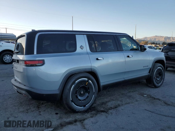 2025 Rivian R1S Adventure with VIN 7PDSGBBA0SN051096, listed as a Copart auction lot 87441054 with 30 mi miles and Salvage Title. Bid and sale history available at carsss.com. Image 3.