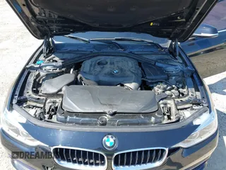 2018 BMW 3 Series 330i with VIN WBA8B9G58JNV00184, listed as a IAAI auction lot 42136004 with 109,896 mi miles. Bid and sale history available at carsss.com. Image 10.