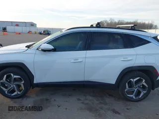 2022 Hyundai Tucson SEL with VIN 5NMJCCAE7NH158933, listed as a IAAI auction lot 41531628 with 57,996 mi miles and . Bid and sale history available at DreamBid. Image 14.