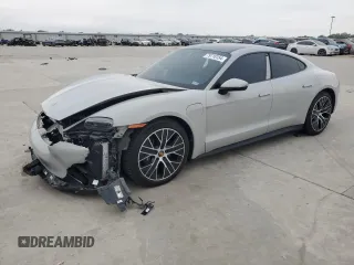 2022 Porsche Taycan z VIN WP0AA2Y19NSA14634, wystawiony jako Copart lot #79716154 z przebiegiem 40 718 mil mil oraz Szkoda całkowita • Salvage title. Historia ofert i sprzedaży dostępna na DreamBid. Obrazek 1.