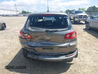 2011 Volkswagen Tiguan SEL z VIN WVGBV7AX5BW512203, wystawiony jako IAAI lot #42273838 z przebiegiem 157 072 mil mil oraz . Historia ofert i sprzedaży dostępna na DreamBid. Obrazek 16.