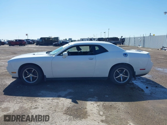 2011 Dodge Challenger z VIN 2B3CJ4DG5BH602787, wystawiony jako IAAI lot #41759684 z przebiegiem 128 055 mil mil oraz . Historia ofert i sprzedaży dostępna na DreamBid. Obrazek 14.