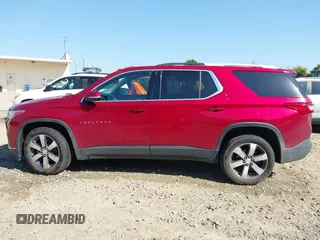 2018 Chevrolet Traverse LT z VIN 1GNERHKW1JJ186565, wystawiony jako IAAI lot #42023809 z przebiegiem 132 159 mil mil oraz . Historia ofert i sprzedaży dostępna na DreamBid. Obrazek 14.