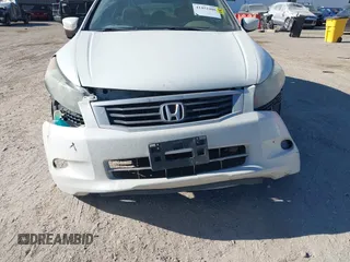 2010 Honda Accord EX-L z VIN 1HGCP3F87AA021545, wystawiony jako IAAI lot #41452486 z przebiegiem 140 615 mil mil oraz . Historia ofert i sprzedaży dostępna na DreamBid. Obrazek 6.