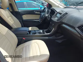 2019 Ford Edge SEL with VIN 2FMPK4J92KBB69060, listed as a IAAI auction lot 42248897 with 130,977 mi miles and . Bid and sale history available at DreamBid. Image 5.