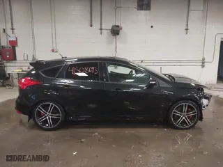2015 Ford Focus ST with VIN 1FADP3L90FL305407, listed as a IAAI auction lot 41508693 with 172,191 mi miles. Bid and sale history available at carsss.com. Image 14.