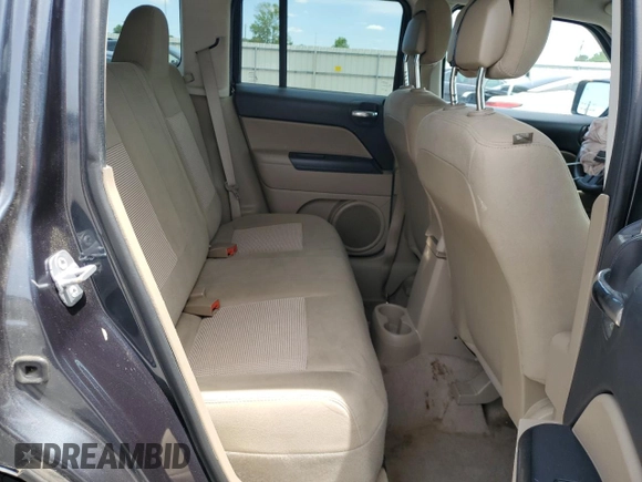 2014 Jeep Patriot Sport z VIN 1C4NJPBB8ED850548, wystawiony jako Copart lot #55945905 z przebiegiem 120 321 mil mil oraz Szkoda całkowita • Salvage title. Historia ofert i sprzedaży dostępna na DreamBid. Obrazek 11.