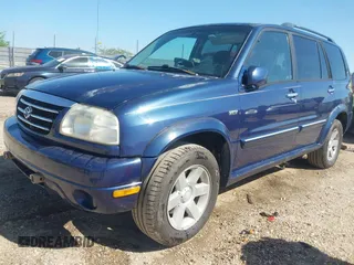 2003 Suzuki XL7 Touring z VIN JS3TX92V234104722, wystawiony jako IAAI lot #41994253 z przebiegiem 185 553 mil mil oraz . Historia ofert i sprzedaży dostępna na DreamBid. Obrazek 2.