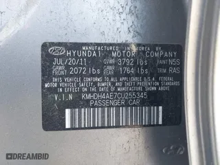 2012 Hyundai Elantra GLS with VIN KMHDH4AE7CU255345, listed as a IAAI auction lot 41520440 with 119,130 mi miles. Bid and sale history available at carsss.com. Image 9.