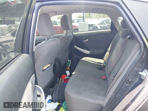 2015 Toyota Prius Four with VIN JTDKN3DUXF0401038, listed as a IAAI auction lot 42461797 with 142,302 mi miles and . Bid and sale history available at DreamBid. Image 8.