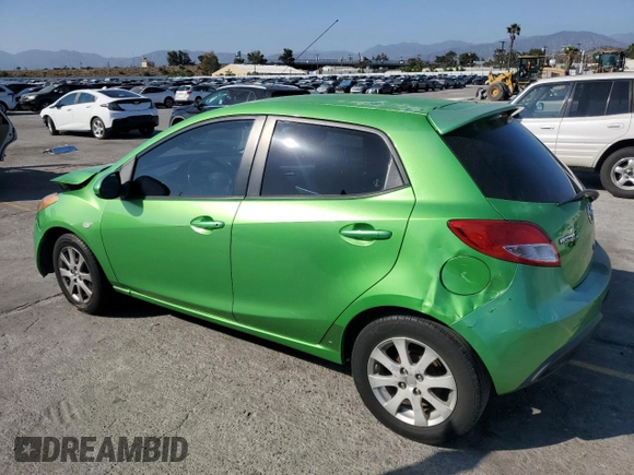 2011 Mazda 2 Touring z VIN JM1DE1HZ4B0115764, wystawiony jako Copart lot #56161455 z przebiegiem 134 274 mil mil oraz Szkoda całkowita • Salvage title. Historia ofert i sprzedaży dostępna na DreamBid. Obrazek 2.