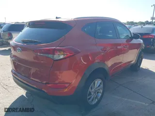 2017 Hyundai Tucson SE Plus with VIN KM8J33A40HU318652, listed as a IAAI auction lot 42092018 with 249,498 mi miles. Bid and sale history available at carsss.com. Image 4.