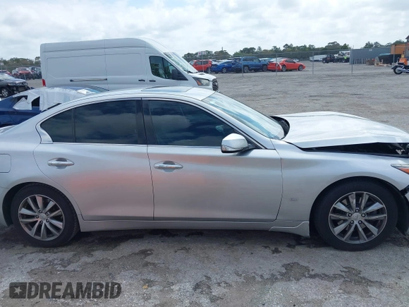 2014 Infiniti Q50 Premium z VIN JN1BV7AP9EM690381, wystawiony jako IAAI lot #41761562 z przebiegiem 107 099 mil mil oraz . Historia ofert i sprzedaży dostępna na DreamBid. Obrazek 13.