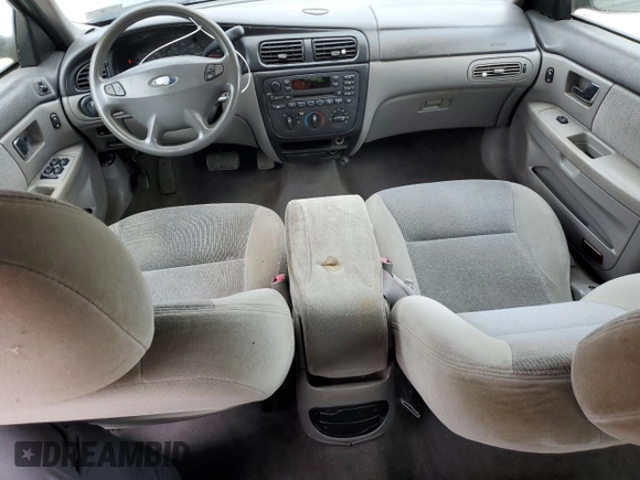 2000 Ford Taurus SE z VIN 1FAFP53U5YA259273, wystawiony jako Copart lot #52787305 z przebiegiem 234 848 mil mil oraz Szkoda całkowita • Salvage title. Historia ofert i sprzedaży dostępna na DreamBid. Obrazek 8.
