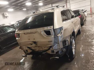 2015 Jeep Grand Cherokee Summit with VIN 1C4RJFJG5FC918837, listed as a IAAI auction lot 41126436 with 155,516 mi miles. Bid and sale history available at carsss.com. Image 17.