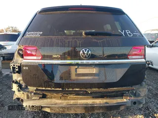 2023 Volkswagen Atlas SE z VIN 1V2DP2CA5PC556082, wystawiony jako IAAI lot #41072963 z przebiegiem 31 670 mil mil oraz . Historia ofert i sprzedaży dostępna na DreamBid. Obrazek 6.