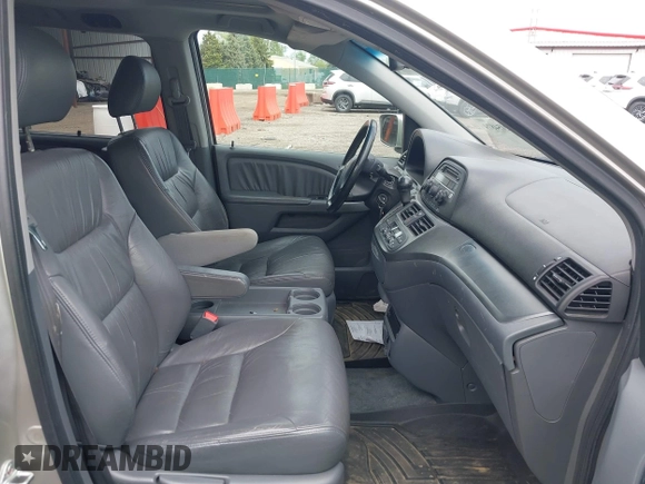 2007 Honda Odyssey EX-L with VIN 5FNRL38767B455948, listed as a IAAI auction lot 42154879 with 232,645 mi miles and . Bid and sale history available at DreamBid. Image 5.