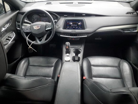 2020 Cadillac XT4 FWD Premium Luxury with VIN 1GYFZCR48LF043018, listed as a Copart auction lot 45097125 with 84,567 mi miles and Salvage Title. Bid and sale history available at carsss.com. Image 8.