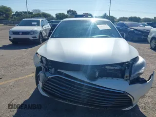 2016 Toyota Avalon Limited with VIN 4T1BK1EB1GU207322, listed as a IAAI auction lot 42030270 with 77,127 mi miles and . Bid and sale history available at carsss.com. Image 6.