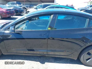 2022 Tesla Model 3 Long Range with VIN 5YJ3E1EB3NF104313, listed as a IAAI auction lot 41832803 with 39,061 mi miles and . Bid and sale history available at DreamBid. Image 14.