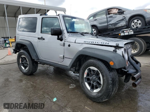 2013 Jeep Wrangler Rubicon с VIN 1C4BJWCG4DL684492, выставлен на аукционе Copart как лот 78515634 с пробегом 169 267 миль миль и Списание • Salvage title. История ставок и продаж доступна на DreamBid. Изображение 4.