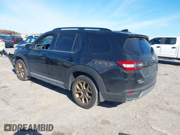 2023 Honda Pilot Elite with VIN 5FNYG1H87PB045057, listed as a IAAI auction lot 41748553 with 44,329 mi miles and . Bid and sale history available at DreamBid. Image 3.