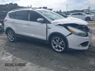 2014 Ford Escape Titanium с VIN 1FMCU0J95EUE21089, выставлен на аукционе IAAI как лот 41612889 с пробегом 147 738 миль миль и . История ставок и продаж доступна на DreamBid. Изображение 1.