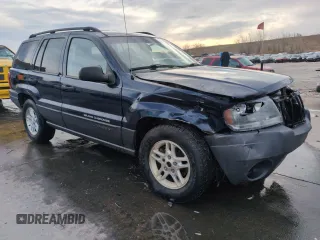 2004 Jeep Grand Cherokee Laredo with VIN 1J4GW48S84C200259, listed as a Copart auction lot 51002325 with 158,193 mi miles and Salvage Title. Bid and sale history available at carsss.com. Image 4.