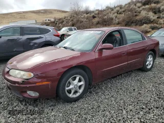 2001 Oldsmobile Aurora z VIN 1G3GR64H614153225, wystawiony jako Copart lot #86864344 z przebiegiem 205 280 mil mil oraz Szkoda całkowita • Salvage title. Historia ofert i sprzedaży dostępna na DreamBid. Obrazek 1.