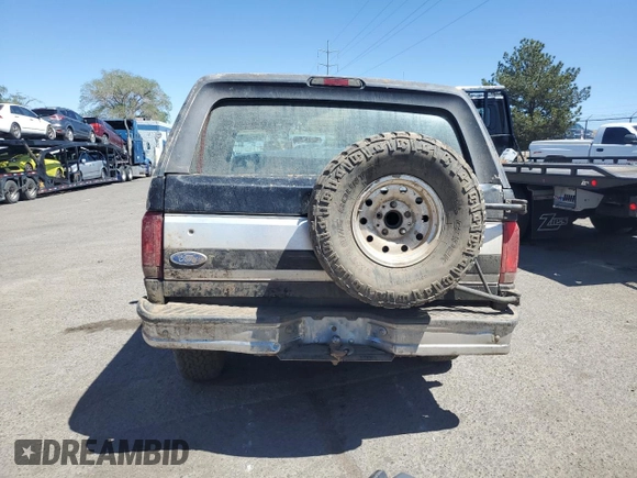 1996 Ford Bronco Custom with VIN 1FMEU15H6TLB18163, listed as a Copart auction lot 51802494 with 151,134 mi miles and Salvage Title. Bid and sale history available at DreamBid. Image 6.