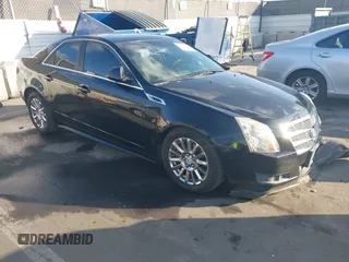 2011 Cadillac CTS z VIN 1G6DA5EY0B0135351, wystawiony jako IAAI lot #41433130 z przebiegiem 111 120 mil mil oraz . Historia ofert i sprzedaży dostępna na DreamBid. Obrazek 1.