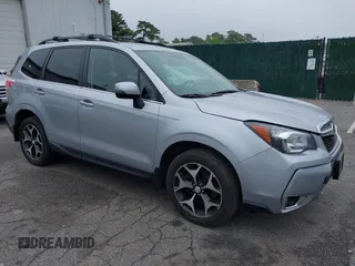 2014 Subaru Forester XT Touring with VIN JF2SJGMC1EH552474, listed as a IAAI auction lot 42461663 with 121,482 mi miles and . Bid and sale history available at DreamBid. Image 1.