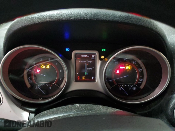 2013 Dodge Journey American Value with VIN 3C4PDCAB4DT581984, listed as a Copart auction lot 59953515 with 166,927 mi miles and Salvage title. Bid and sale history available at DreamBid. Image 9.