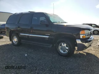 2003 GMC Yukon SLT z VIN 1GKEC13Z43R287134, wystawiony jako Copart lot #53506615 z przebiegiem 199 629 mil mil oraz Szkody całkowita. Historia ofert i sprzedaży dostępna na DreamBid. Obrazek 4.