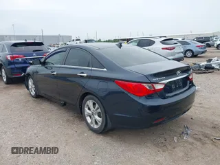 2012 Hyundai Sonata SE z VIN 5NPEC4AC7CH341786, wystawiony jako IAAI lot #41890326 z przebiegiem 114 678 mil mil oraz . Historia ofert i sprzedaży dostępna na DreamBid. Obrazek 3.