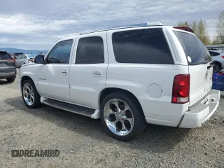 2002 Cadillac Escalade z VIN 1GYEK63N42R110276, wystawiony jako Copart lot #52862665 z przebiegiem Nie podano mil oraz Szkoda całkowita • Salvage title. Historia ofert i sprzedaży dostępna na DreamBid. Obrazek 2.