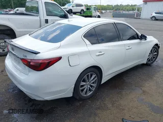 2021 Infiniti Q50 Pure with VIN JN1EV7AR7MM752535, listed as a IAAI auction lot 42683119 with 45,121 mi miles and . Bid and sale history available at DreamBid. Image 4.