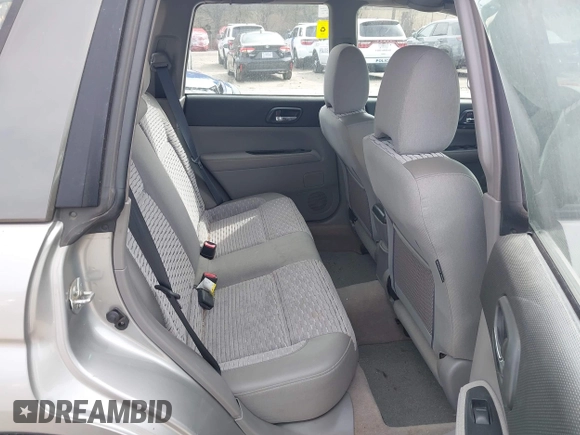 2005 Subaru Forester XS with VIN JF1SG65695H735272, listed as a IAAI auction lot 41949103 with 105,780 mi miles and . Bid and sale history available at DreamBid. Image 8.